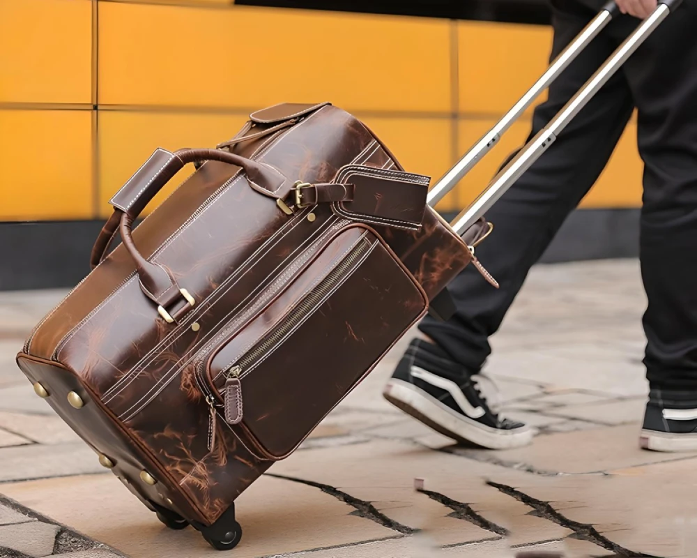 leather carry on bag wheels